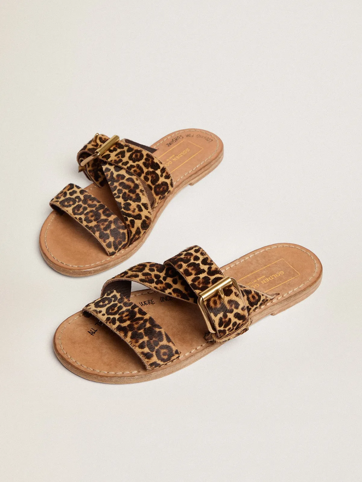 Women's flat sandals in leopard print pony skin