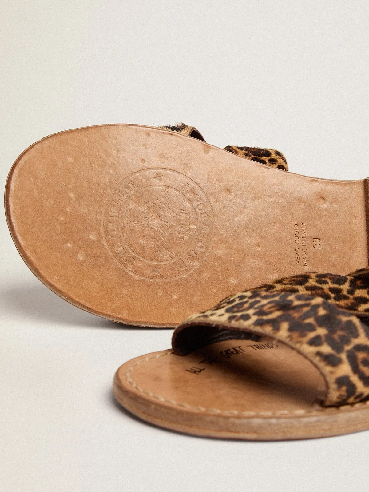 Women's flat sandals in leopard print pony skin